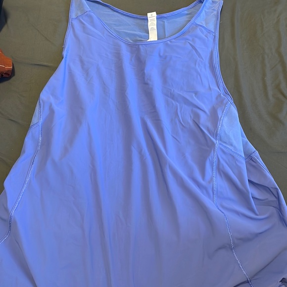 This is a size 12 blue lululemon tank top never worn in perfect condition - Picture 1 of 3